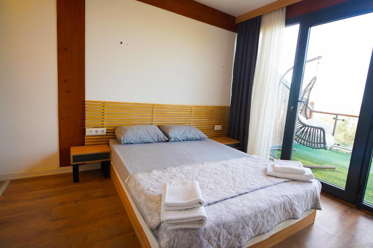 Qcunda Otel ไอวาลิค ภายนอก รูปภาพ
