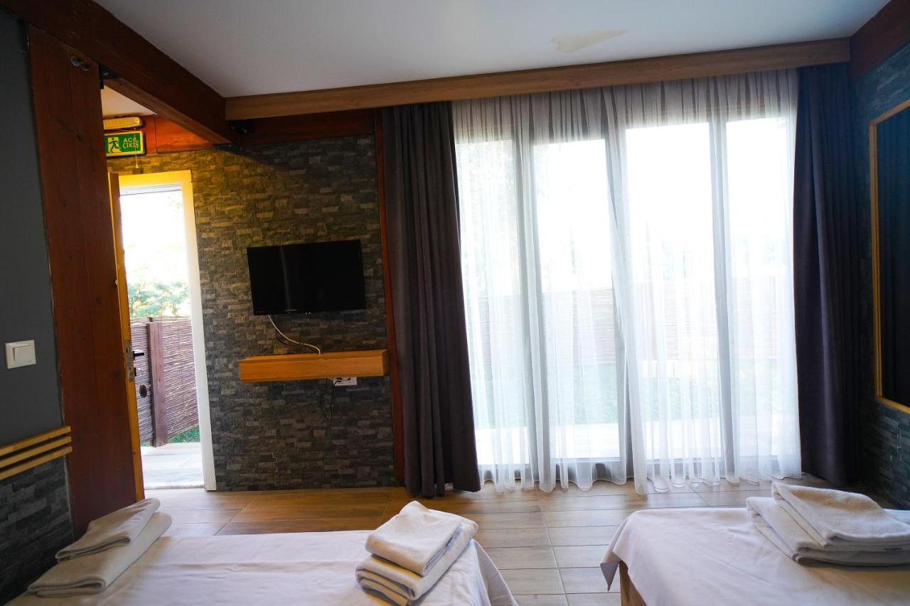 Qcunda Otel ไอวาลิค ภายนอก รูปภาพ