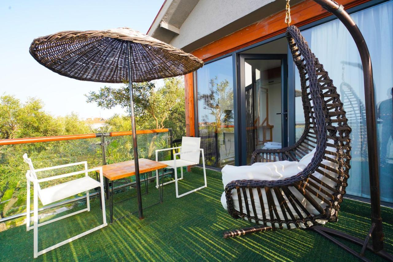 Qcunda Otel ไอวาลิค ภายนอก รูปภาพ