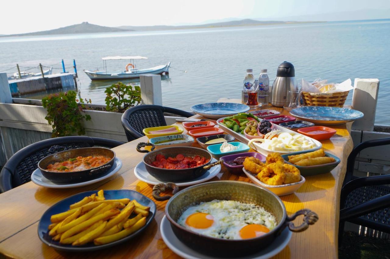 Qcunda Otel ไอวาลิค ภายนอก รูปภาพ