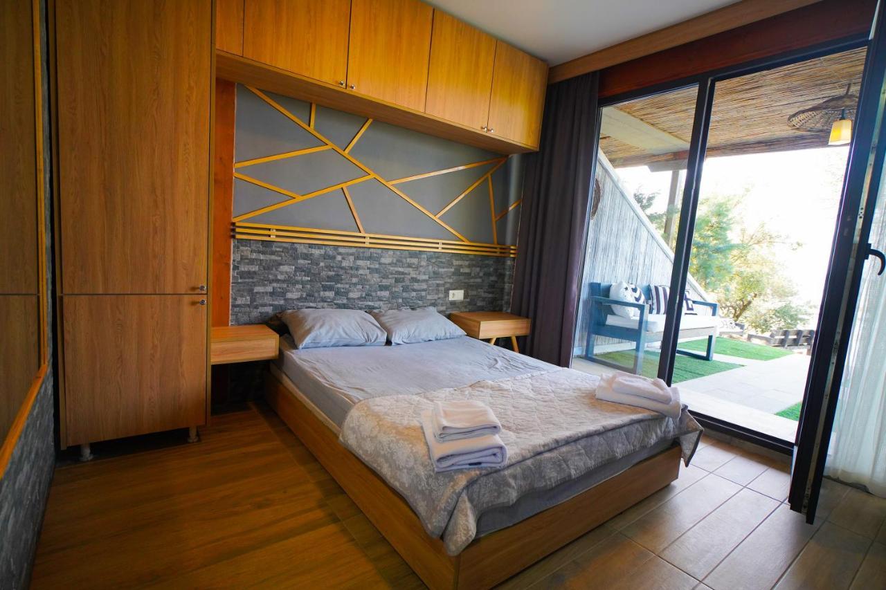 Qcunda Otel ไอวาลิค ภายนอก รูปภาพ