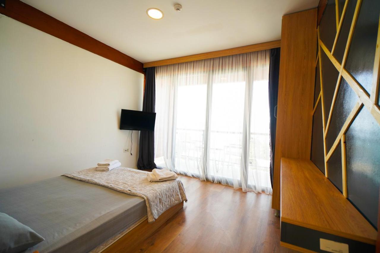 Qcunda Otel ไอวาลิค ภายนอก รูปภาพ