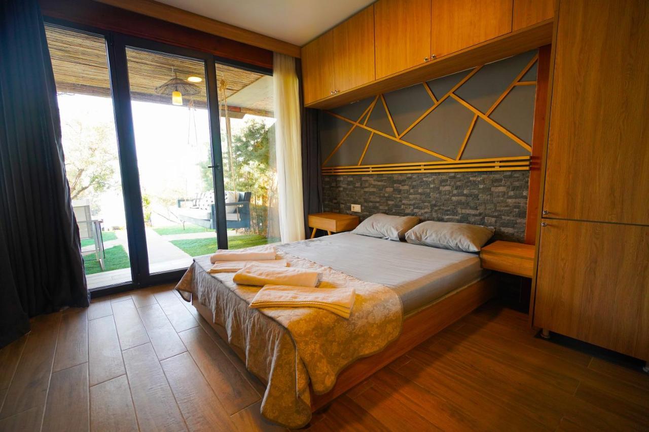 Qcunda Otel ไอวาลิค ภายนอก รูปภาพ