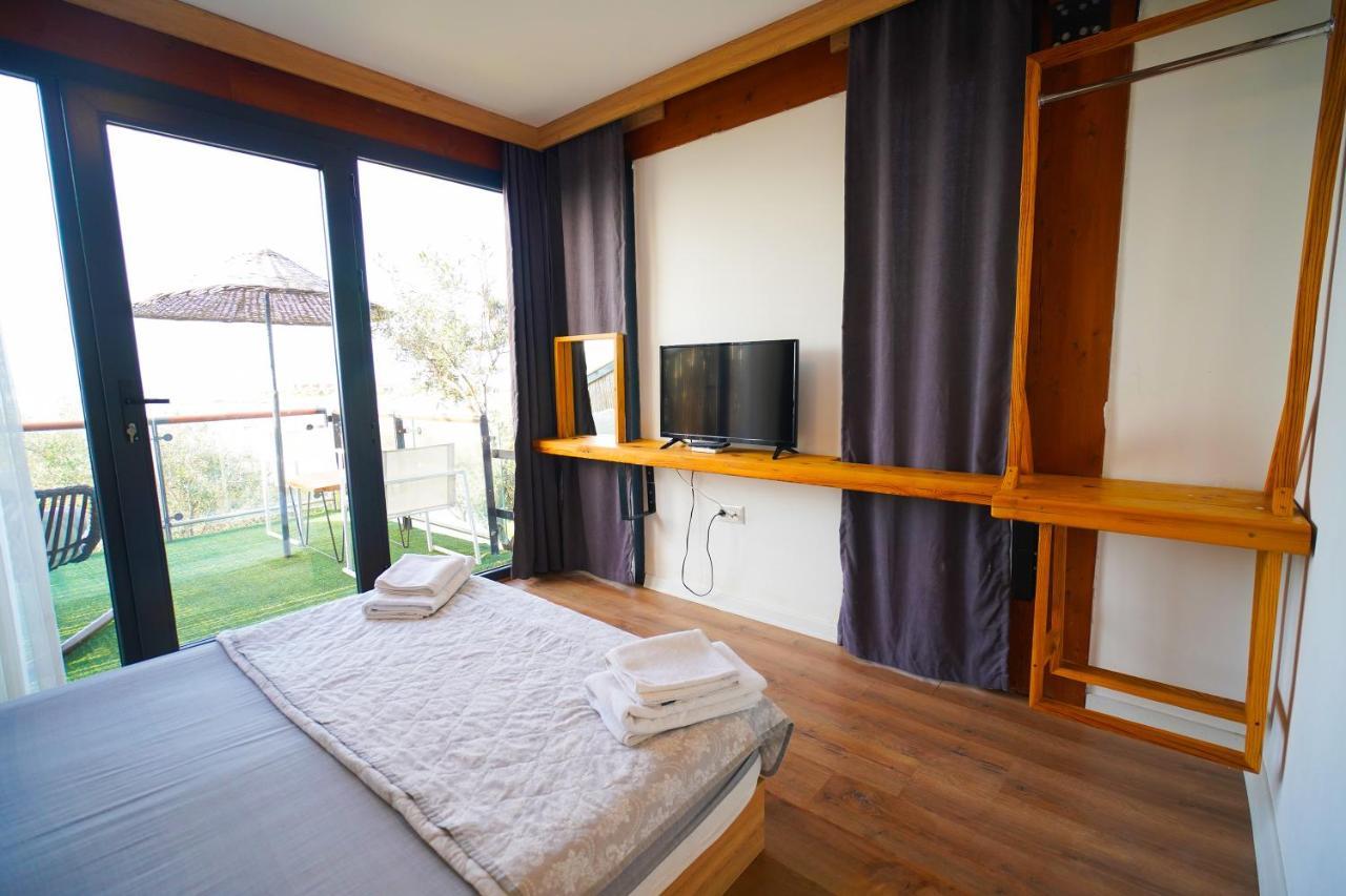 Qcunda Otel ไอวาลิค ภายนอก รูปภาพ